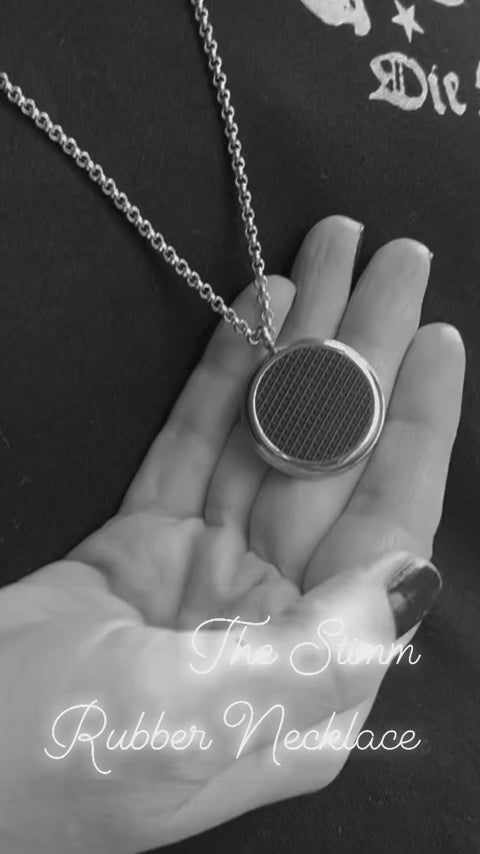 sensory necklace with soft touch rubber pendant